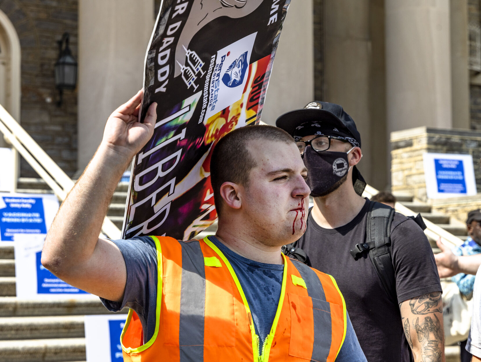 Rally to Vaccinate Penn State, counter protester